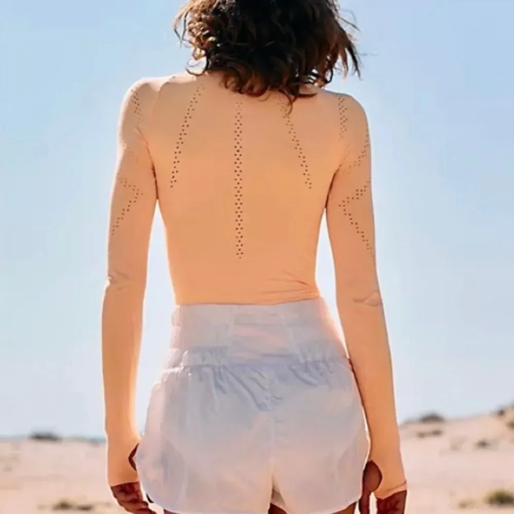8. New! Free People Movement Good Karma Hi-Neck Layer Long Sleeve Top in Peach - Picture 5 of 12